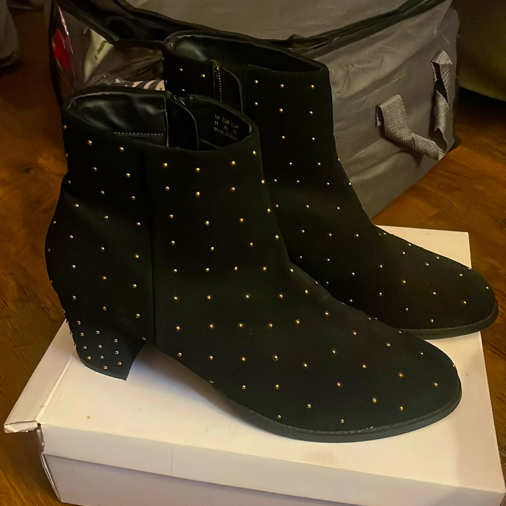black booties with gold pearl detail